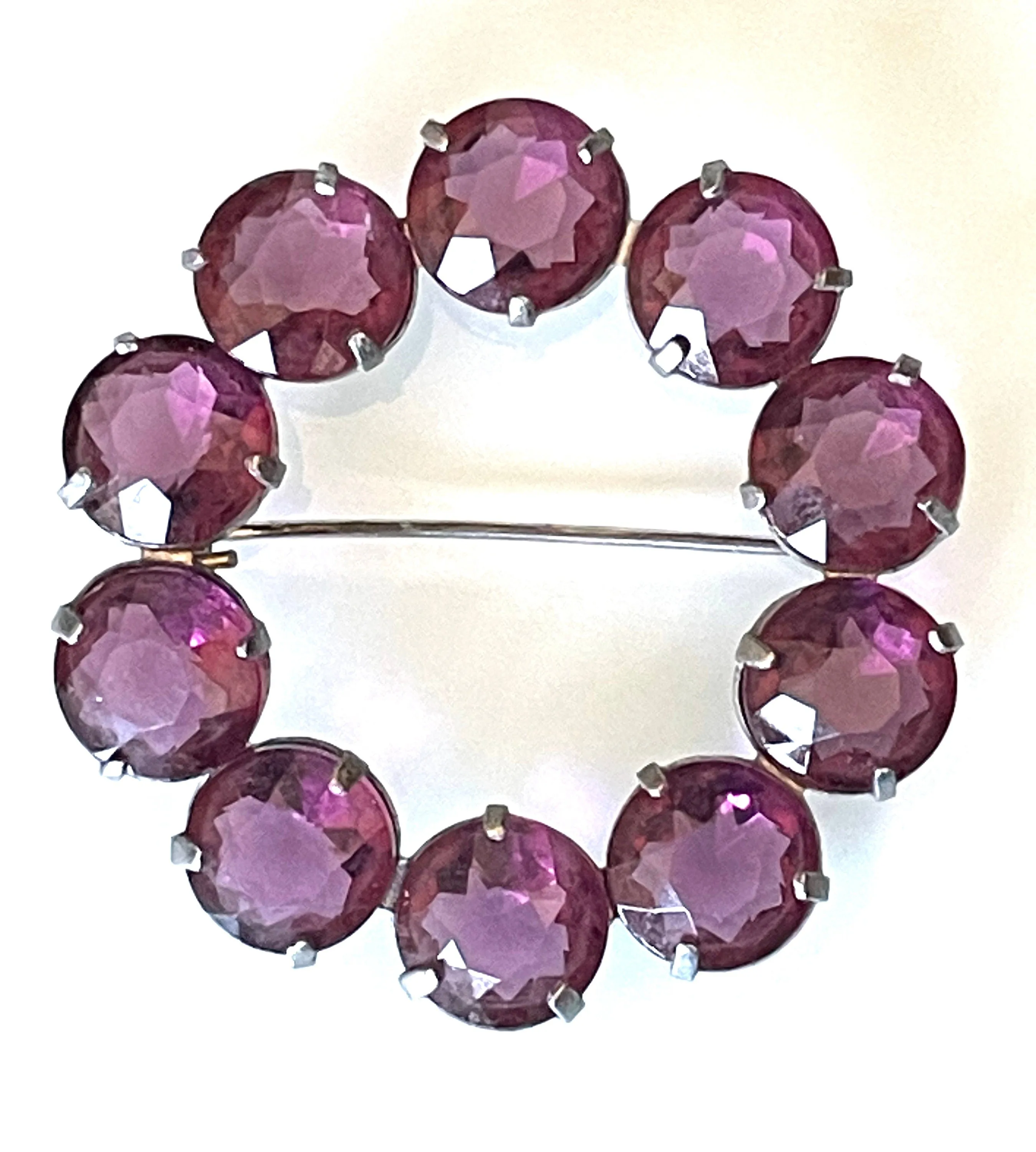 Vintage Art Deco bezel set gorgeous vibrant amethyst purple crystal riviere circle brooch, open-backed rhinestones in silver tone