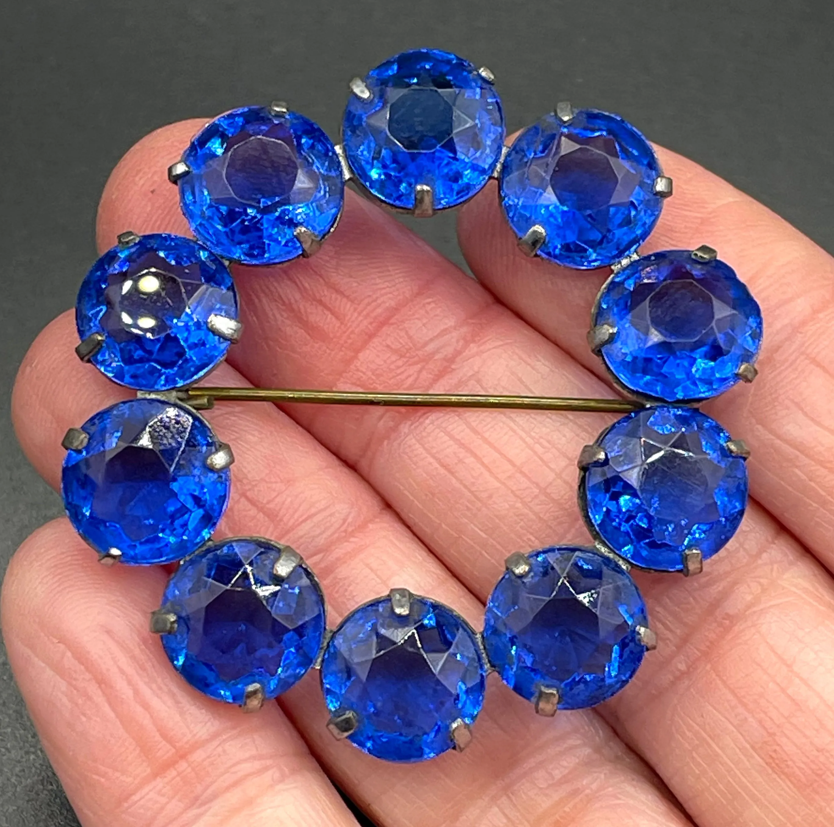 Vintage Art Deco bezel set gorgeous vibrant sapphire blue crystal riviere circle brooch, open-backed rhinestones in silver tone (Copy)