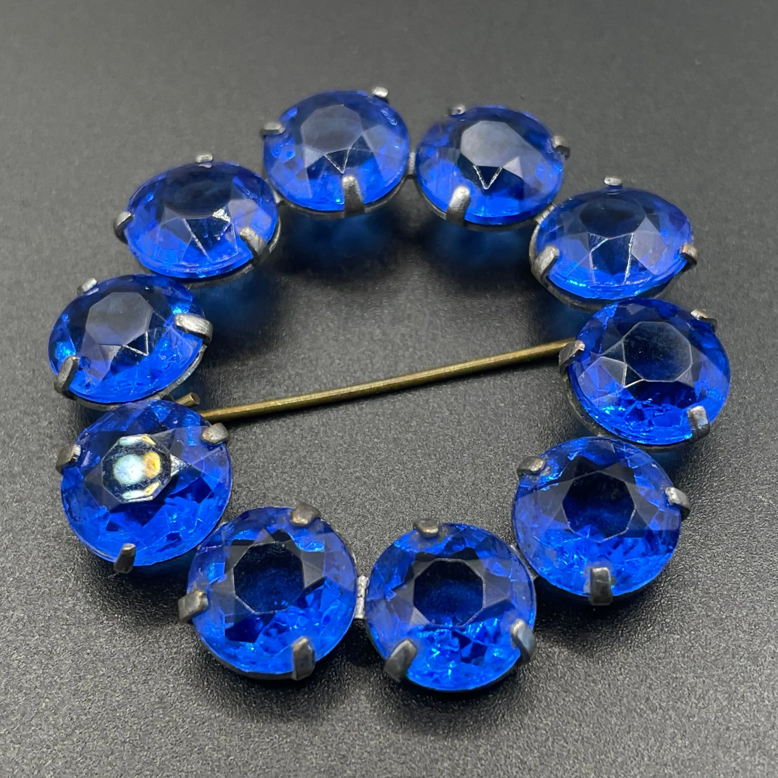 Vintage Art Deco bezel set gorgeous vibrant sapphire blue crystal riviere circle brooch, open-backed rhinestones in silver tone (Copy)